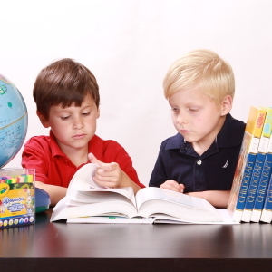 children reading a book